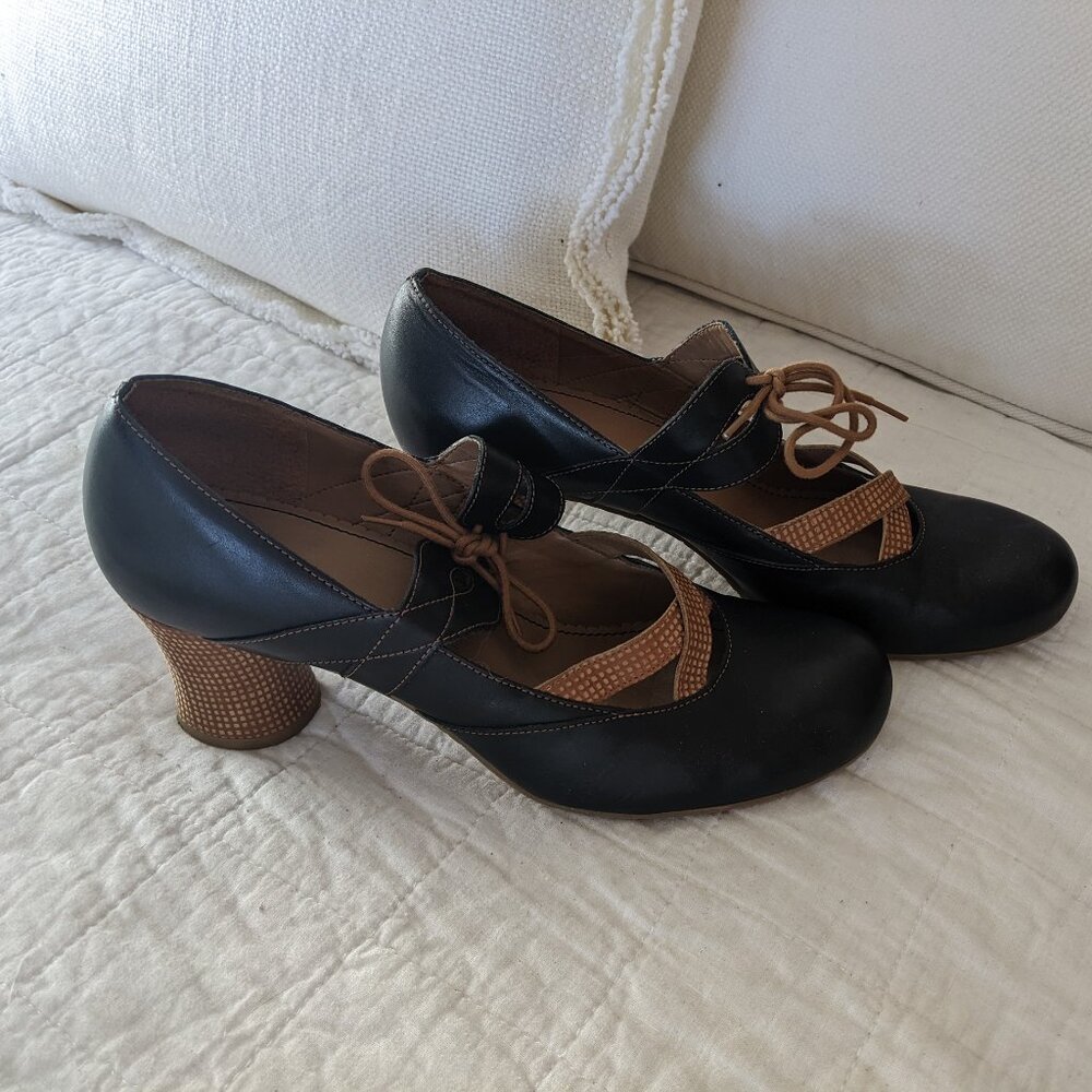 Miss Albright from Anthropologie Black Leather Heels with Tan Accents